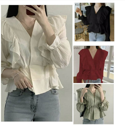 Assorted tops displayed, including t-shirts, blouses, sweaters, and tank tops in various colors and styles, suitable for casual or formal wear depending on the design
